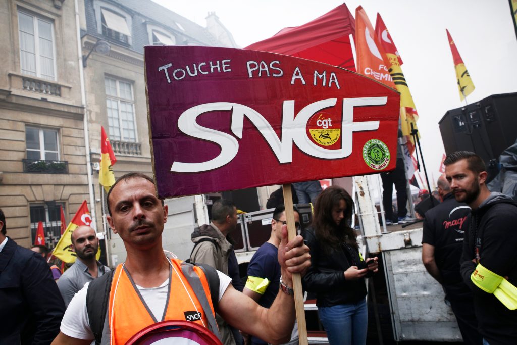 'Don't touch my SNCF'. A protester during a strike in 2018. Image: Shutterstock. © Alexandros Michailidis