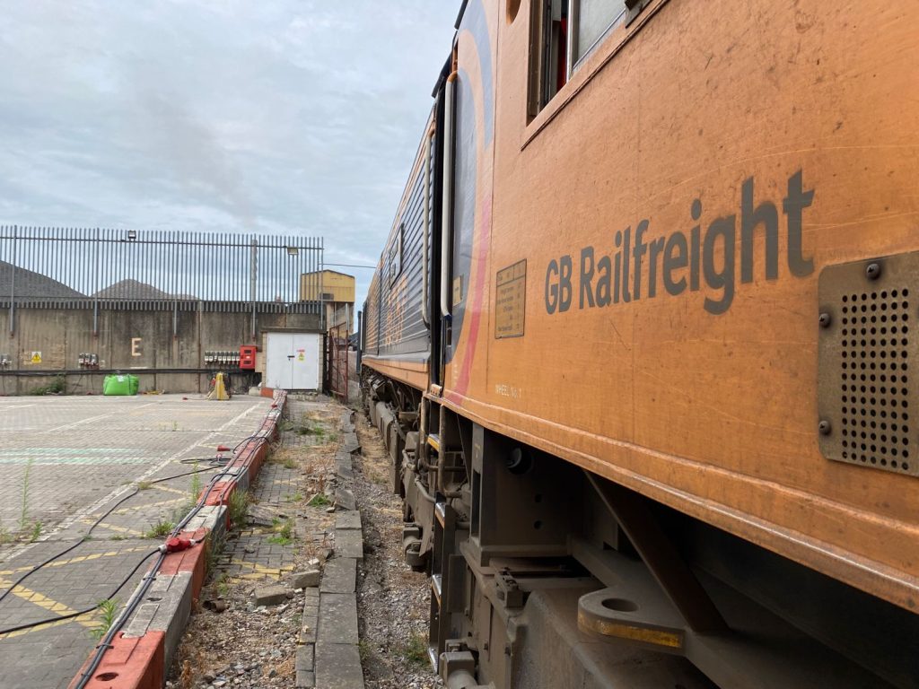 Close up of GB Railfreight logo on the cab of a Class 66 locomotive at Aggregate Industries Purfleet in Essex