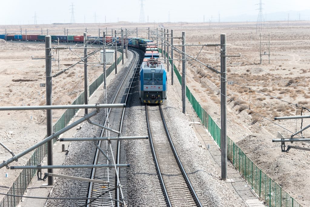 A freight train loaded with containers in Gansu Province, China. Image: Shutterstock. © beibaoke